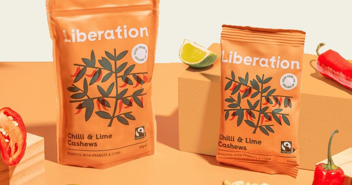 Liberation Foods chilli and lime cashew packs on orange